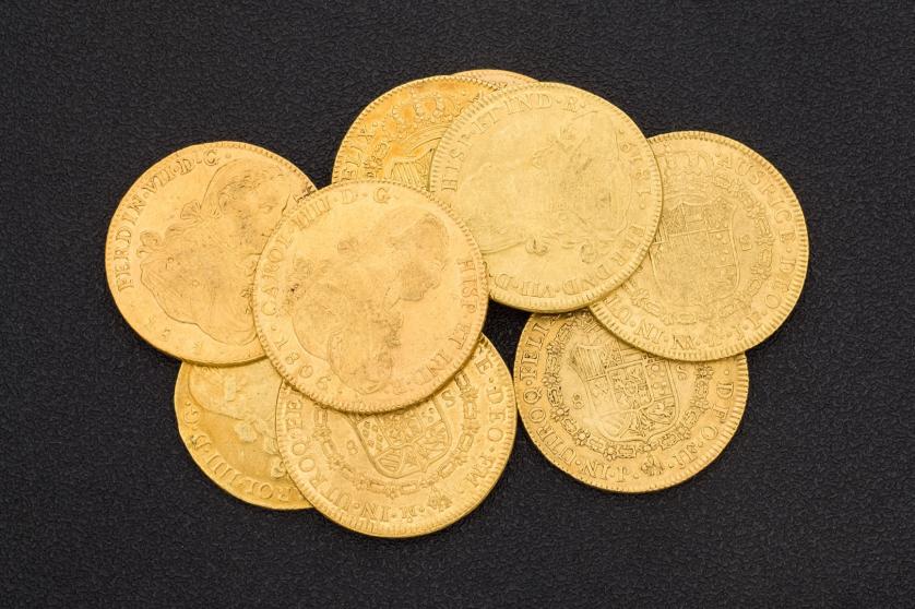 Nueve monedas de ocho escudos 244 gr