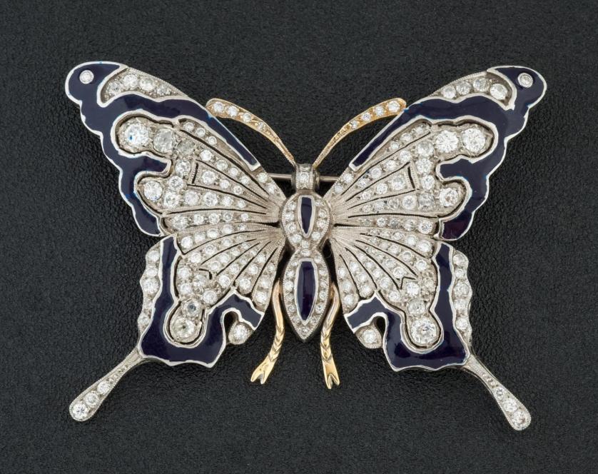 Broche mariposa con esmalte azul y diamantes