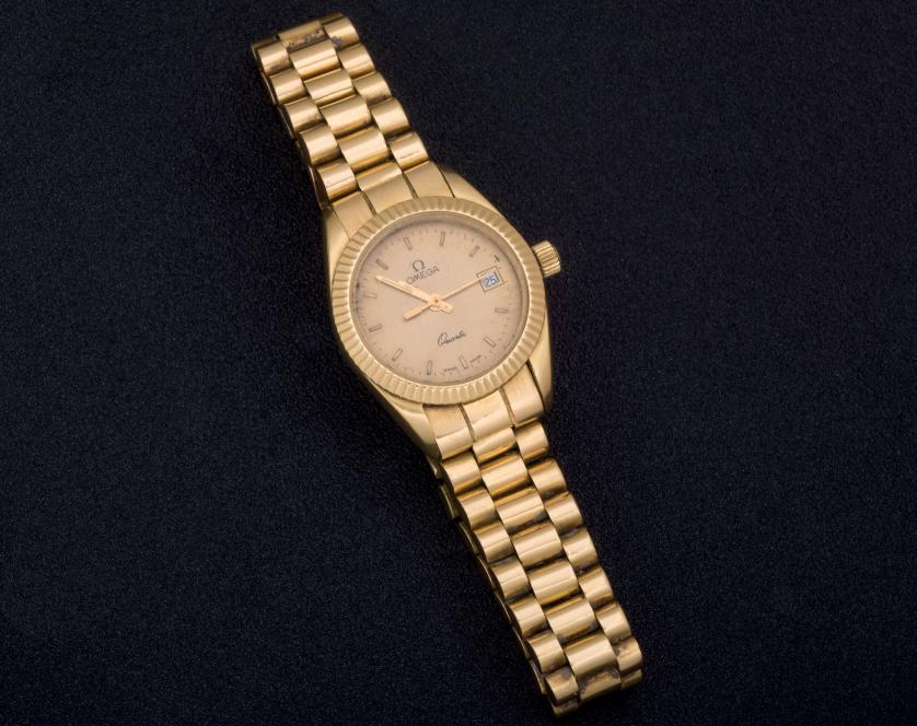 Ladies Omega gold watch