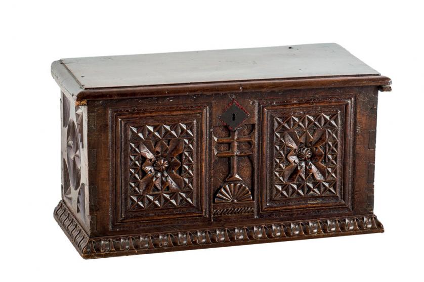 A Spanish wooden carved chest