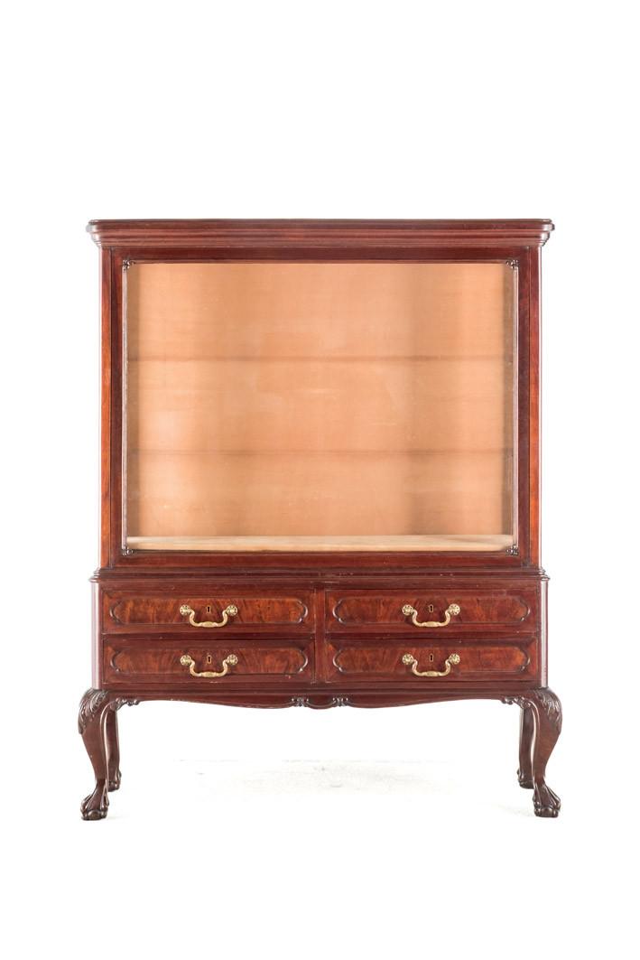 A Chippendale style glass cabinet