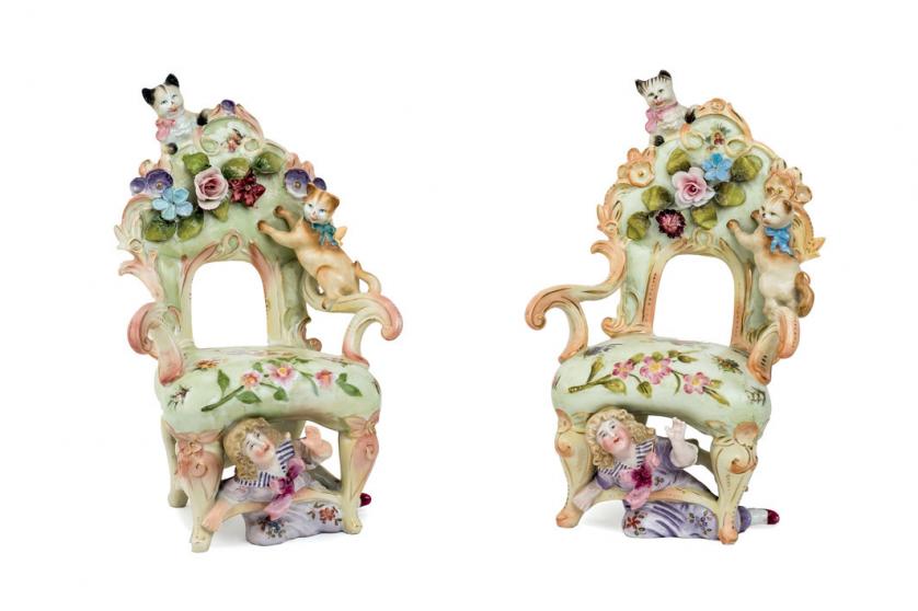 A pair of porcelain chairs, 20th C.