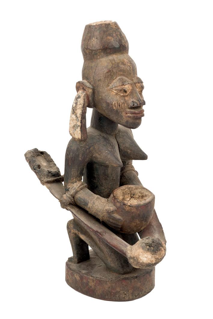 A Yoruba figure of a woman, Nigeria