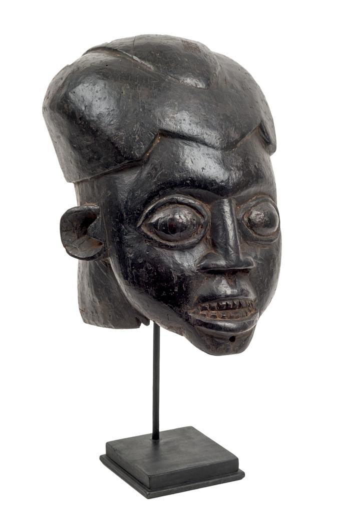 Máscara femenina Ngon, Tikar