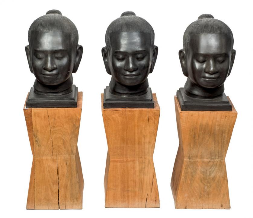 3 cabezas en bronce