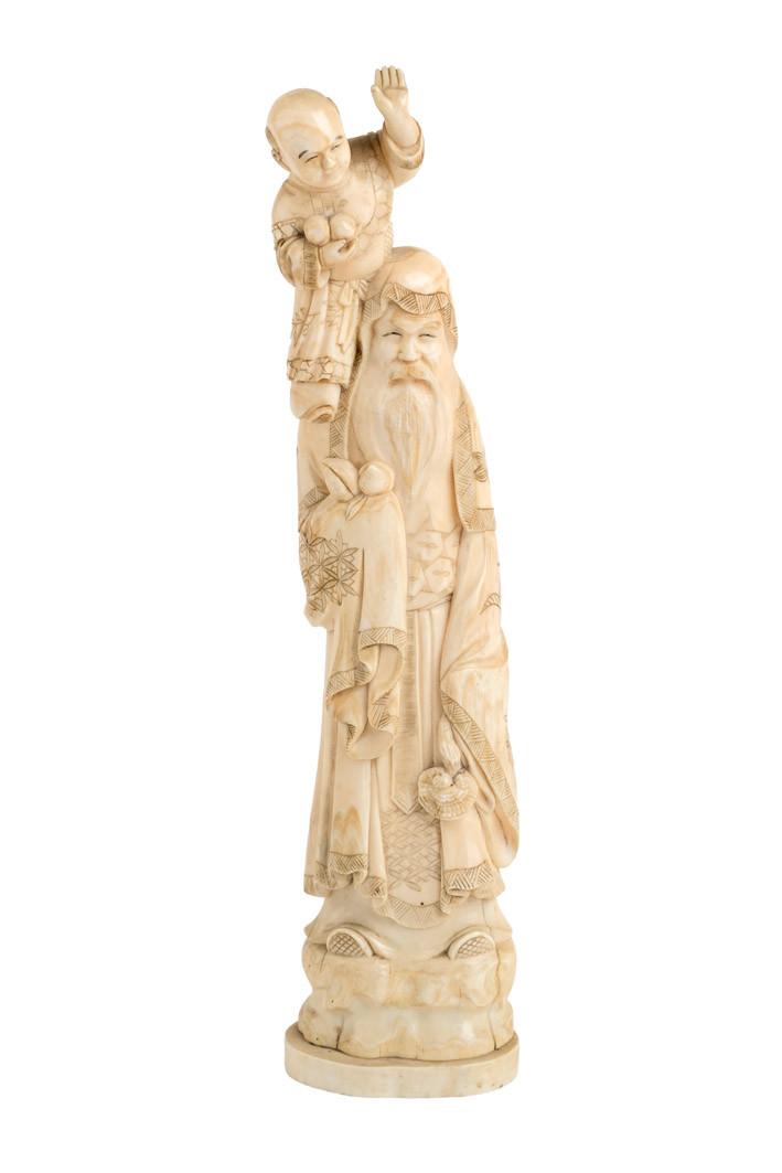 Wiseman with child ivory carving