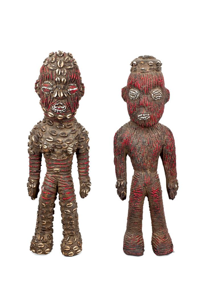 Pair of Bawun figures with cowries
