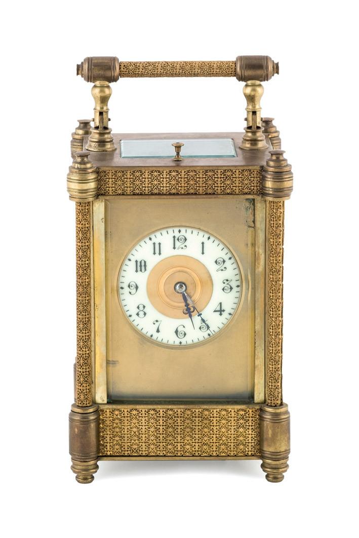 Reloj de viaje en bronce dorado