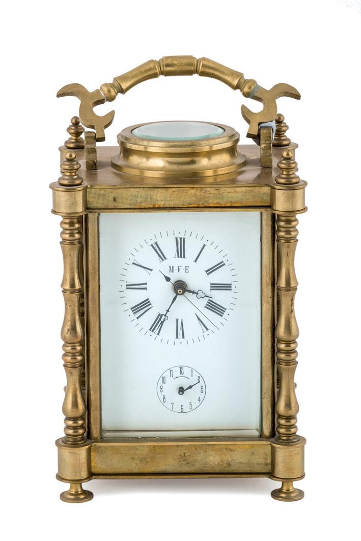 Reloj de viaje de bronce M.F.E.