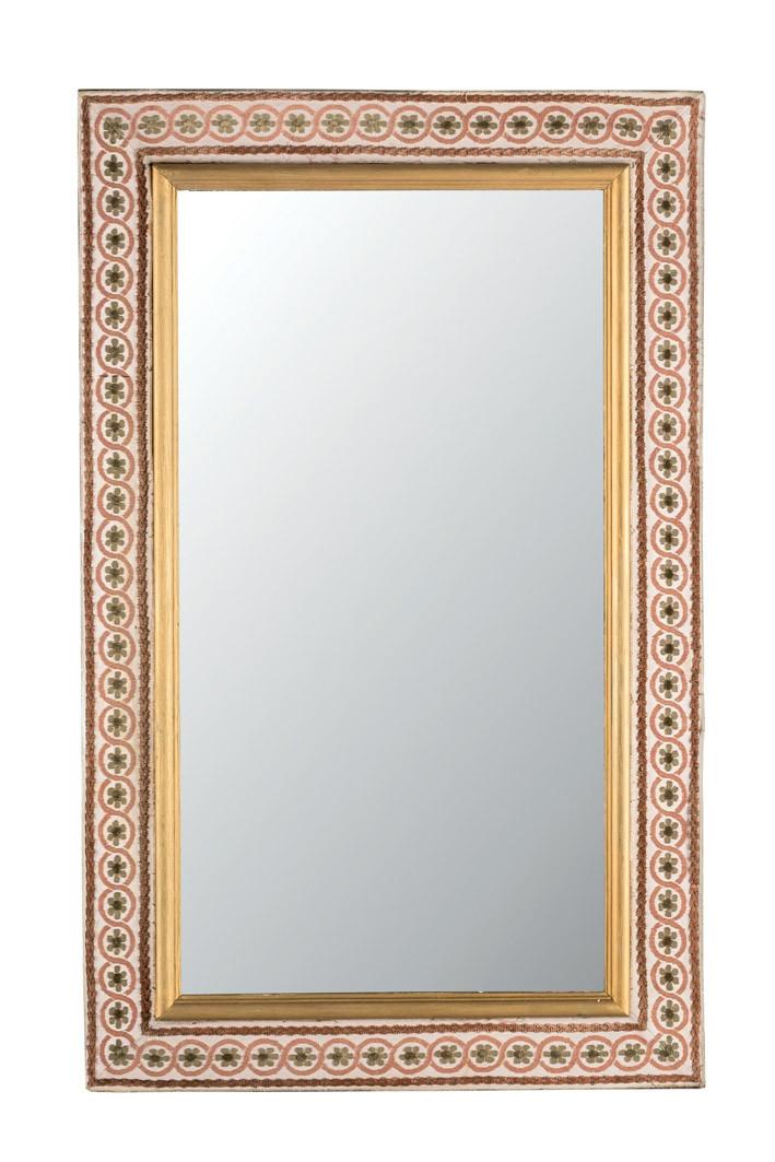 Mirror with upholstered frame
