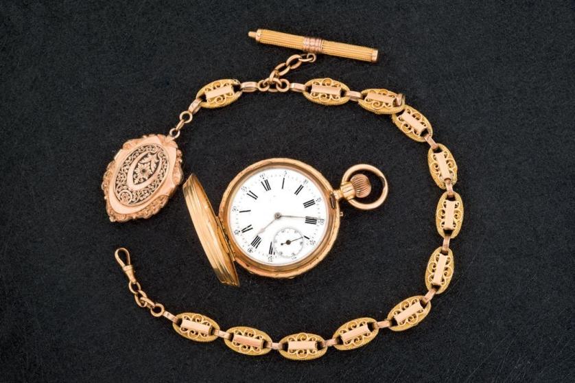 Reloj de bolsillo Huguenin Tissot con leontina