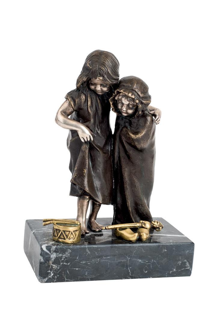 Escultura dos niñas