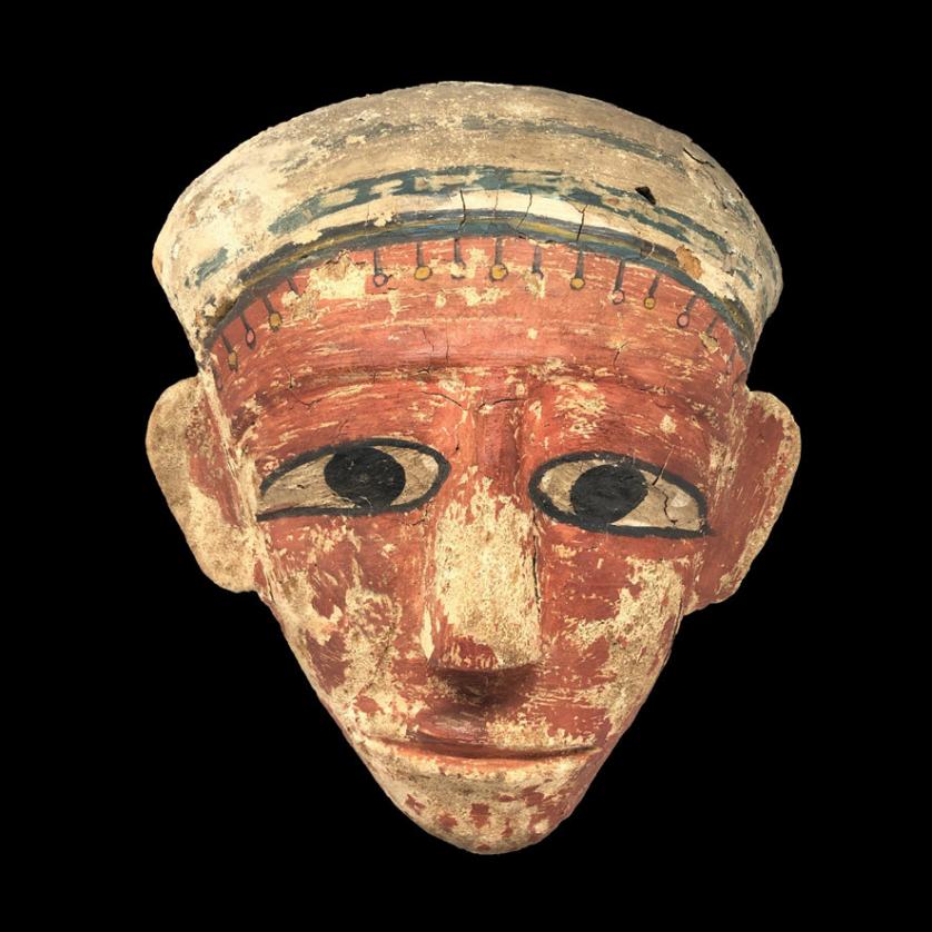 Máscara egipcia de madera policromada.