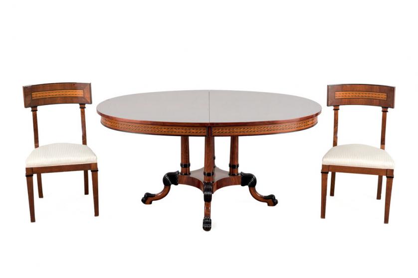 Dining table and seven chairs. 20th century