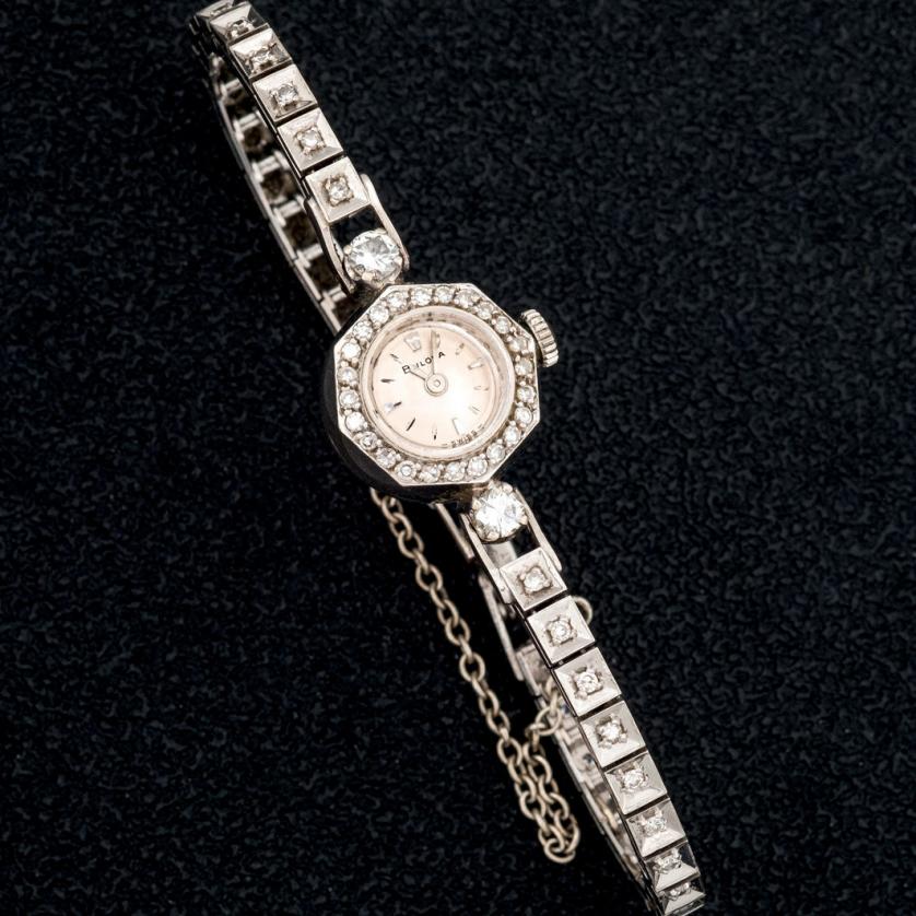 Reloj Bulova de oro 14 K. con diamantes