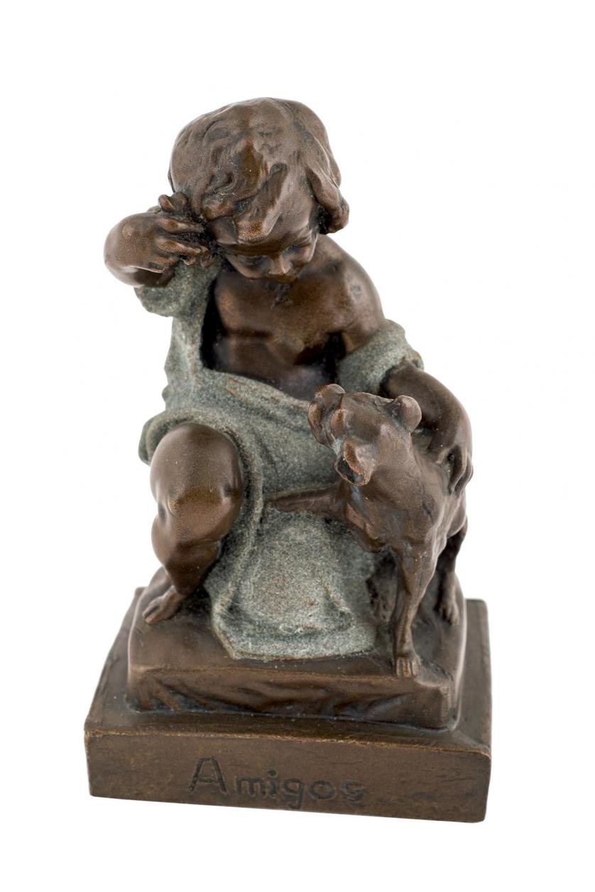 Figura de bronce Niño y perro. S. XX