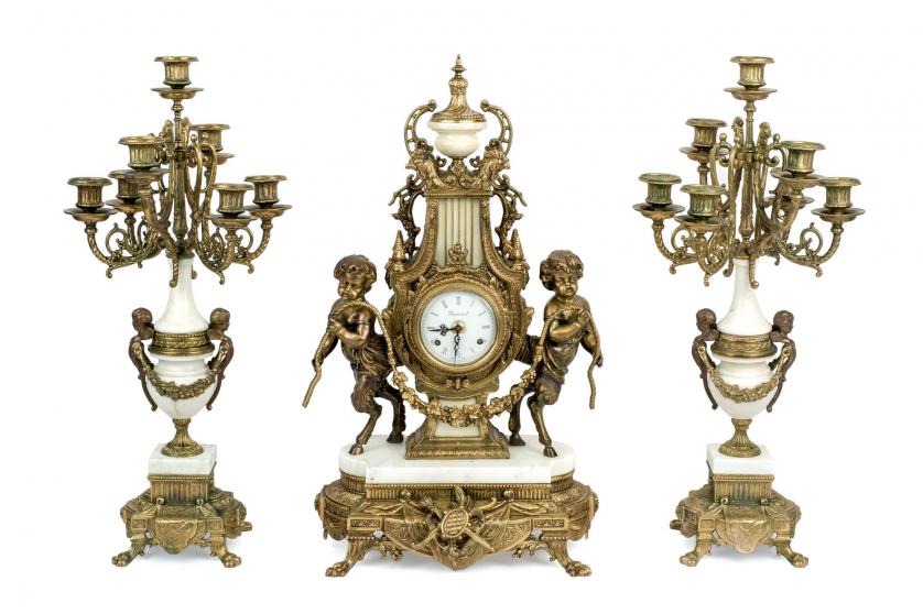 Marble and bronze clock and candelabra. 20th