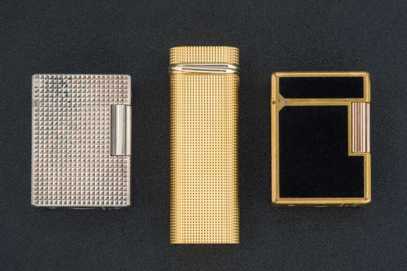 Three pocket lighters. Cartier and Dupont