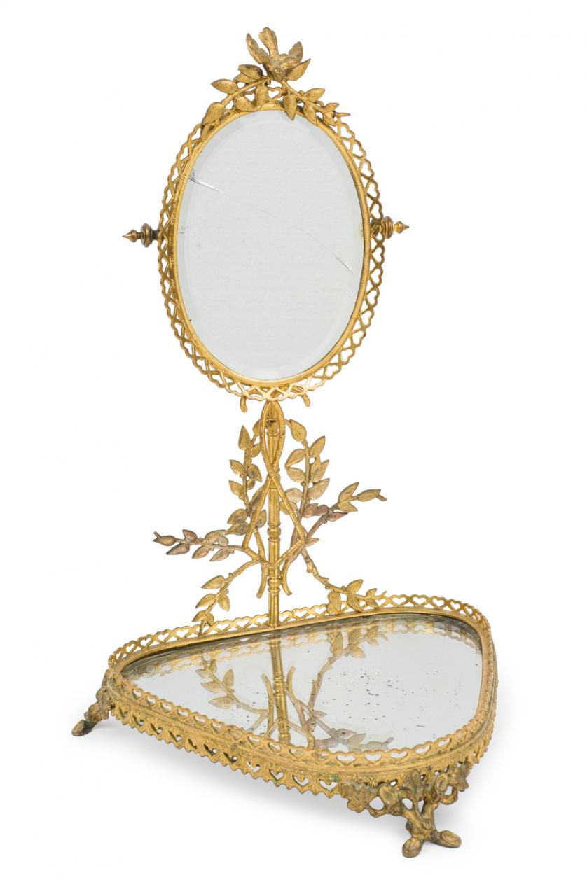 Espejo de tocador en bronce dorado. S. XIX